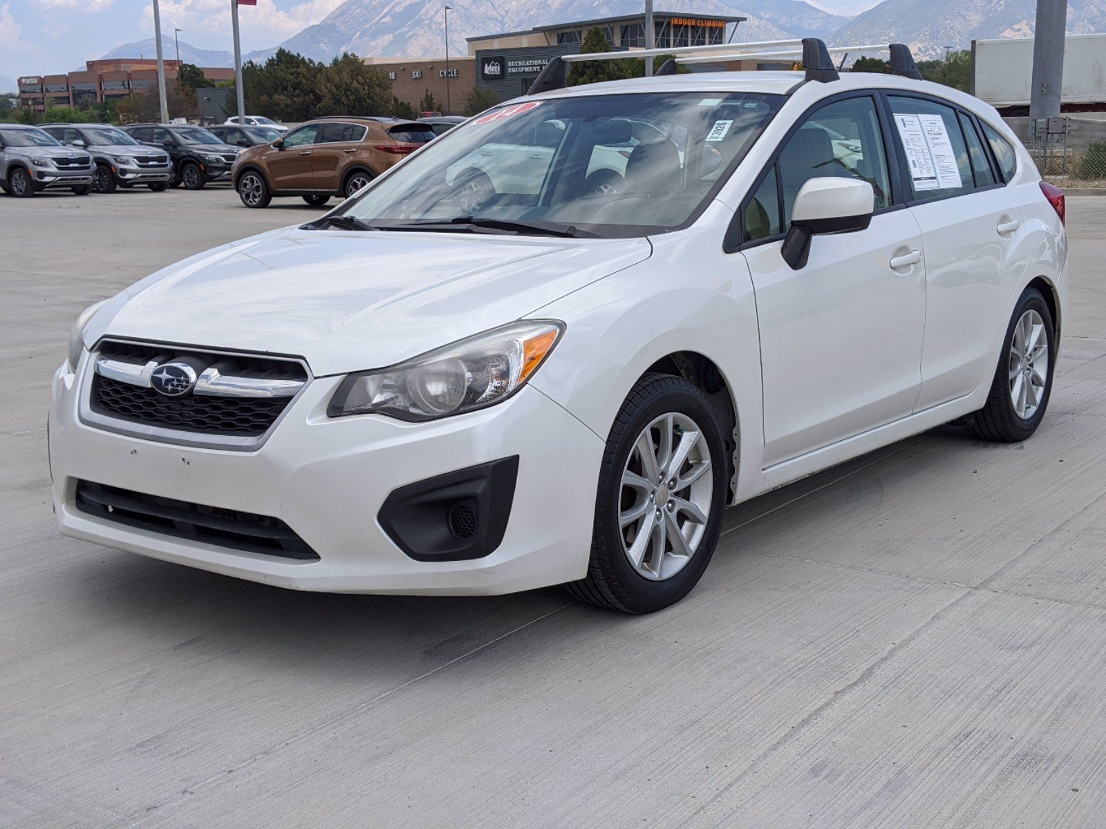 Pre-Owned 2014 Subaru Impreza Wagon 2.0i Premium AWD Hatchback